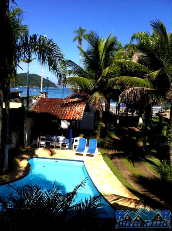Casa enseada (pé na areia )