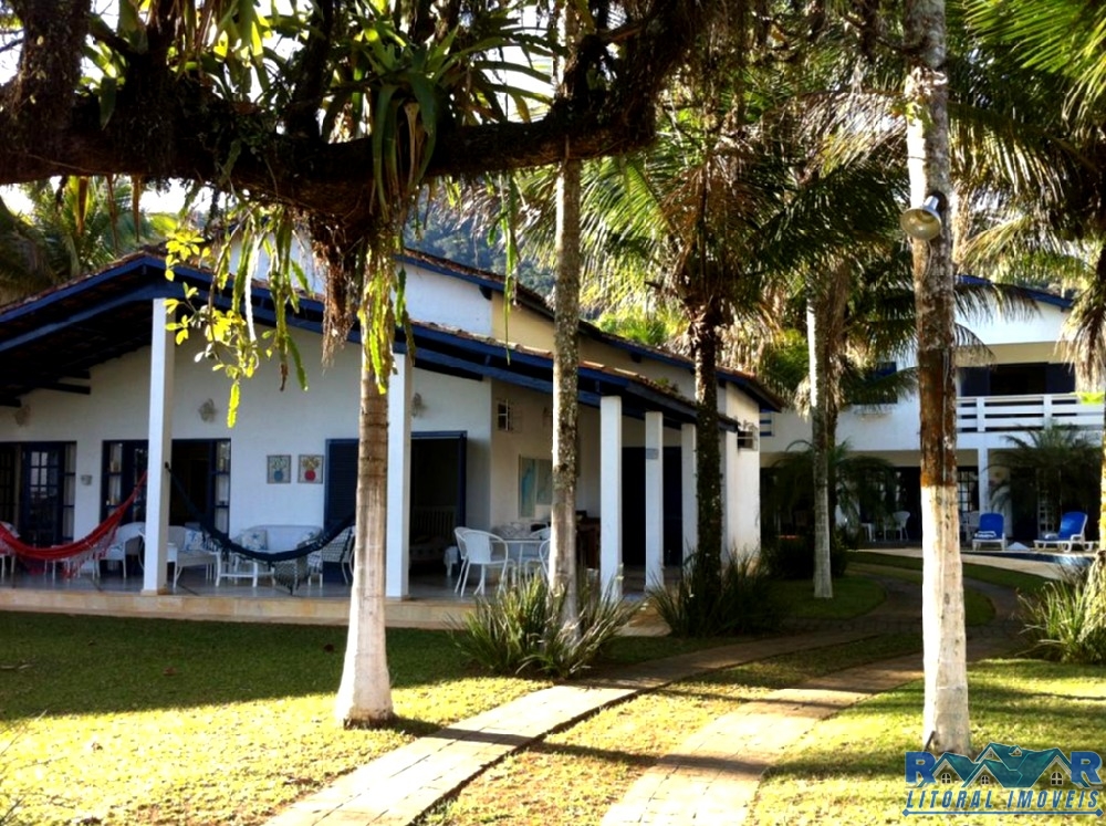 Casa enseada (pé na areia )