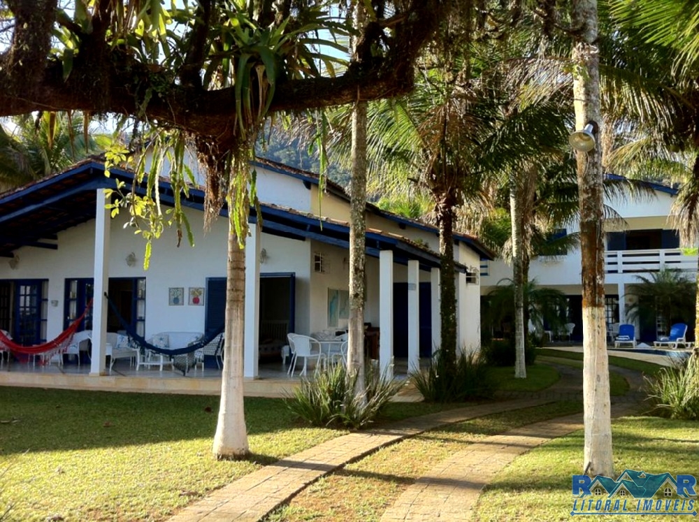 Casa enseada (pé na areia )